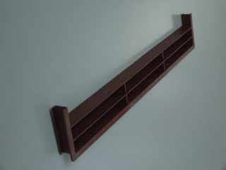 SZERELVÉNYEK - SZELLŐZŐRÁCS MŰANYAG 449 LÁBAZATELEMBE ÉPITHETÖ 390x65x18 mm BARNA #1